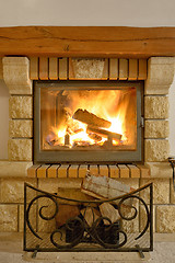 Image showing Roaring flames in  fireplace