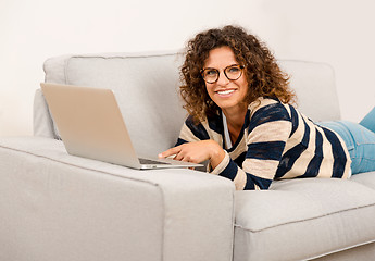 Image showing Beautiful woman working at home