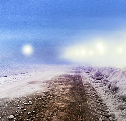 Image showing Snow covered road at night