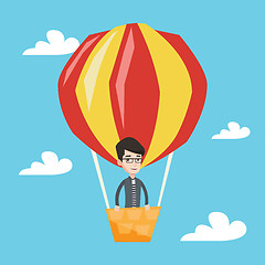 Image showing Man flying in hot air balloon vector illustration.