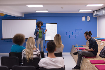 Image showing Black woman Speaker Seminar Corporate Business Meeting Concept