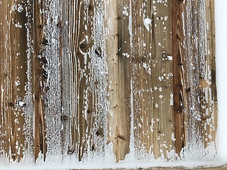 Image showing old wood covered with snow background