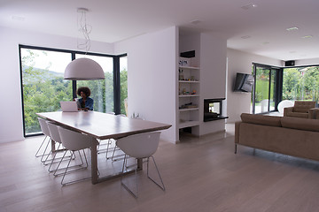 Image showing African American woman in the living room