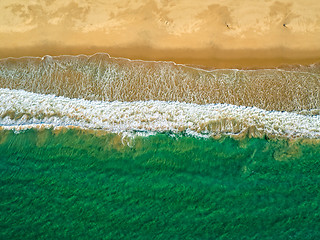 Image showing Aerial View Amazing Seascape with Small Waves on Sandy Beach