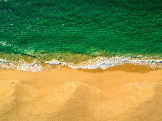 Image showing Aerial View Amazing Seascape with Small Waves on Sandy Beach
