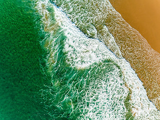 Image showing Aerial View Amazing Seascape with Small Waves on Sandy Beach