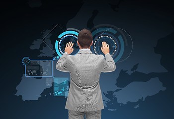 Image showing businessman using virtual screen with europe map