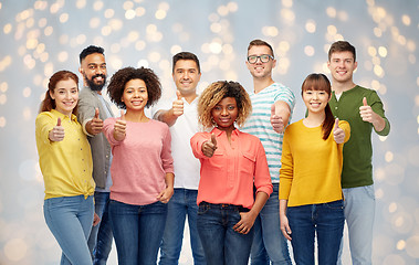 Image showing international group of people showing thumbs up