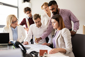 Image showing business team discussing house project at office