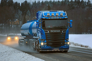 Image showing Blue Scania R580 Tank Truck Trucking on Highway Road Salt