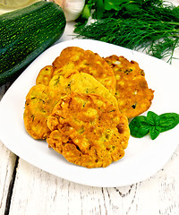 Image showing Flapjack chickpeas with zucchini in plate on light board