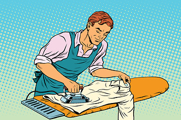 Image showing Vintage employee ironed clothes