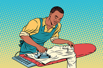 Image showing Vintage employee ironed clothes