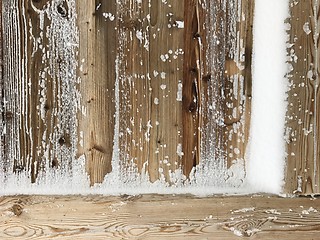 Image showing old wood covered with snow background