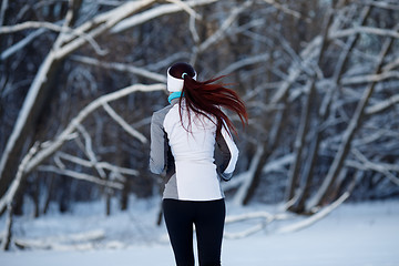 Image showing Photo of jogging young girl