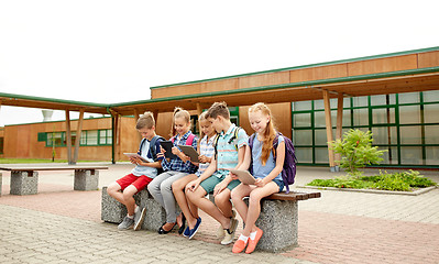 Image showing group of happy elementary school students talking