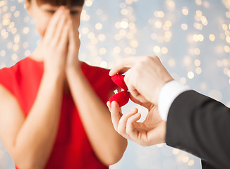 Image showing close up of woman and man with engagement ring