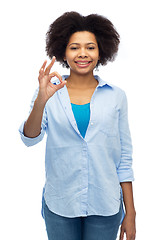 Image showing happy african american woman showing ok hand sign