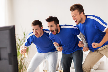 Image showing friends or football fans watching soccer at home