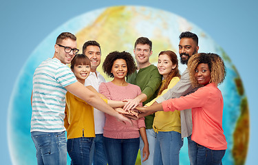 Image showing international group of happy people holding hands