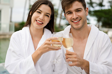 Image showing Young couple tasting wine