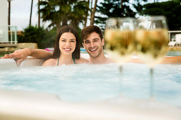 Image showing Tasting wine in a jacuzzi