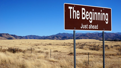 Image showing The Beginning brown road sign