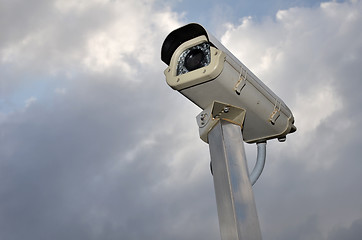 Image showing Security camera against a cloudy sky