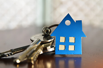 Image showing Bunch of keys with house shaped cardboard