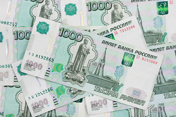 Image showing Background of scattered banknotes - Russian ruble denomination one thousand rubles