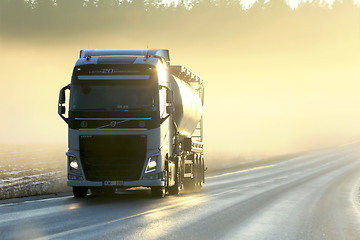 Image showing Volvo Semi Tanker Trucking in Sunset Fog