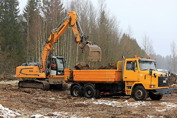 Image showing Liebherr Crawler Excavator Loads Sisu Truck