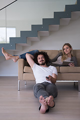 Image showing young couple relaxes in the living room