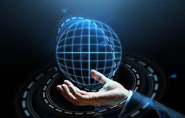 Image showing close up of businessman hand with hologram