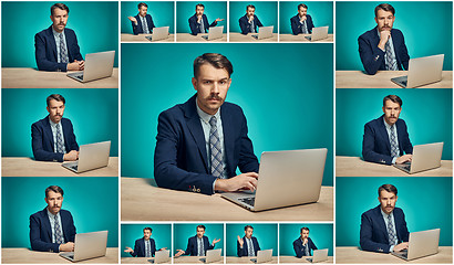 Image showing Sad Young Man Working On computer At Desk