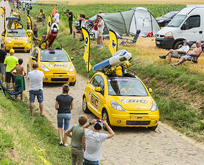 Image showing BIC Caravan on a Cobblestone Road- Tour de France 2015