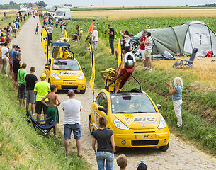 Image showing BIC Caravan on a Cobblestone Road- Tour de France 2015