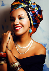 Image showing beauty bright african woman with creative make up, shawl on head like cubian
