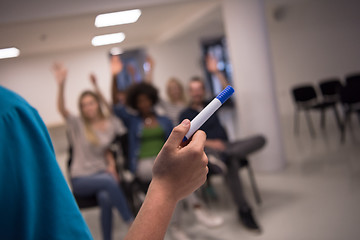 Image showing close up of teacher hand with marker