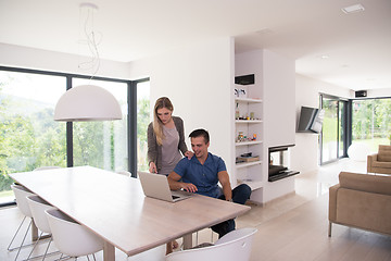 Image showing couple using laptop at home