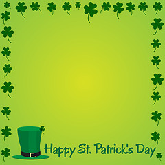 Image showing Leprechaun hat and shamrock on green background