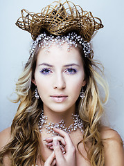 Image showing beauty young snow queen in fairy flashes with hair crown on her head