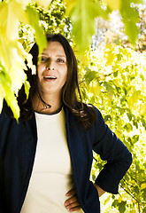 Image showing mature brunette woman in park