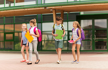 Image showing group of happy elementary school students walking