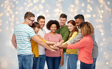 Image showing international group of happy people holding hands