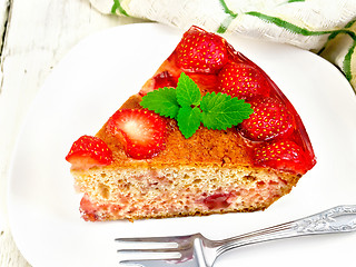 Image showing Pie strawberry with jelly in plate on board