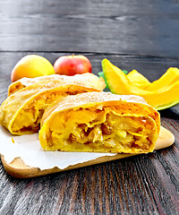 Image showing Strudel pumpkin and apple with raisins on board