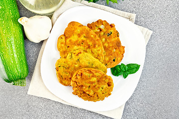 Image showing Flapjack chickpeas in plate on granite table top