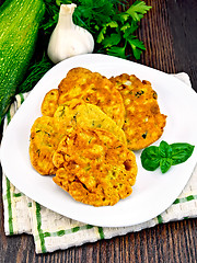 Image showing Flapjack chickpeas with basil in plate on board