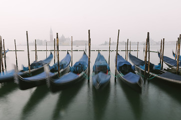 Image showing Gondolas at their moorings in Venice, Veneto, Italy, Europe